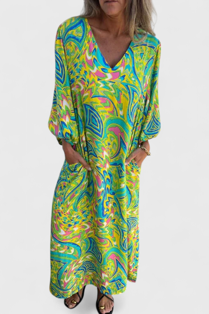 Maxi bohémske šaty Carmina s výstrihom do V a abstraktným vzorom
